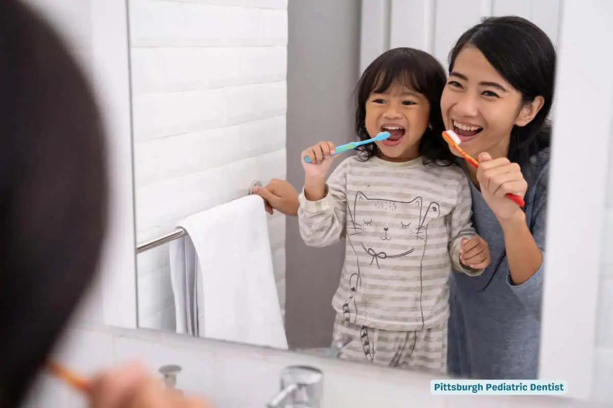 kids brushing their teeth